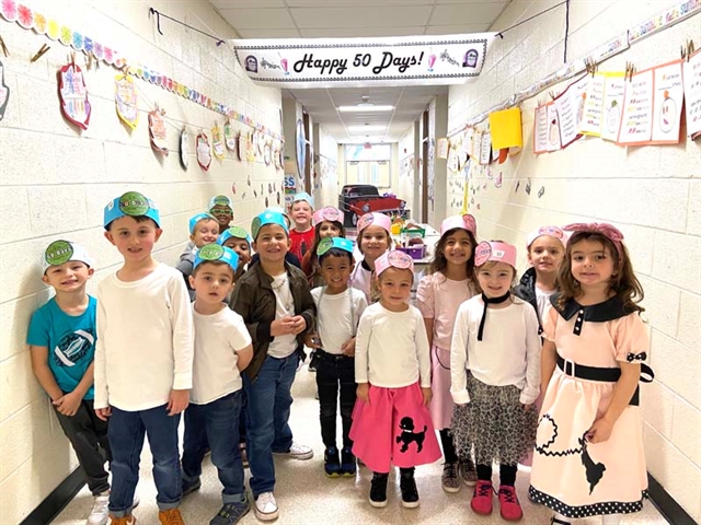 Students dressed up and smiling