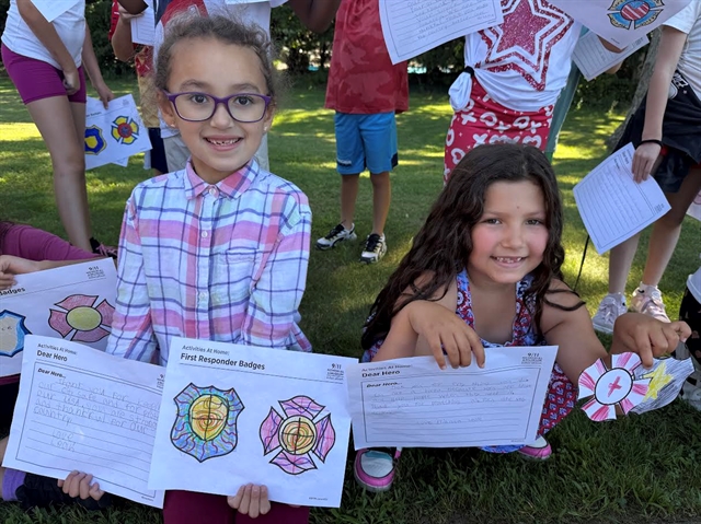 Children holding letters