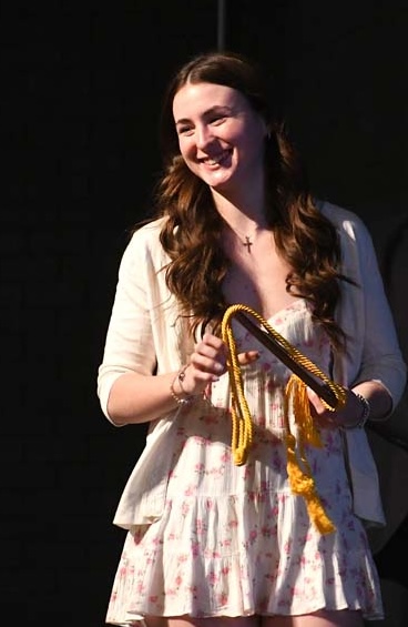 student on stage