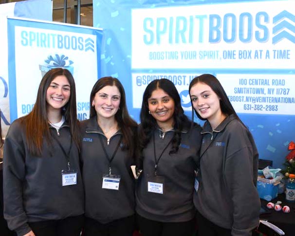 Students posing for picture at event