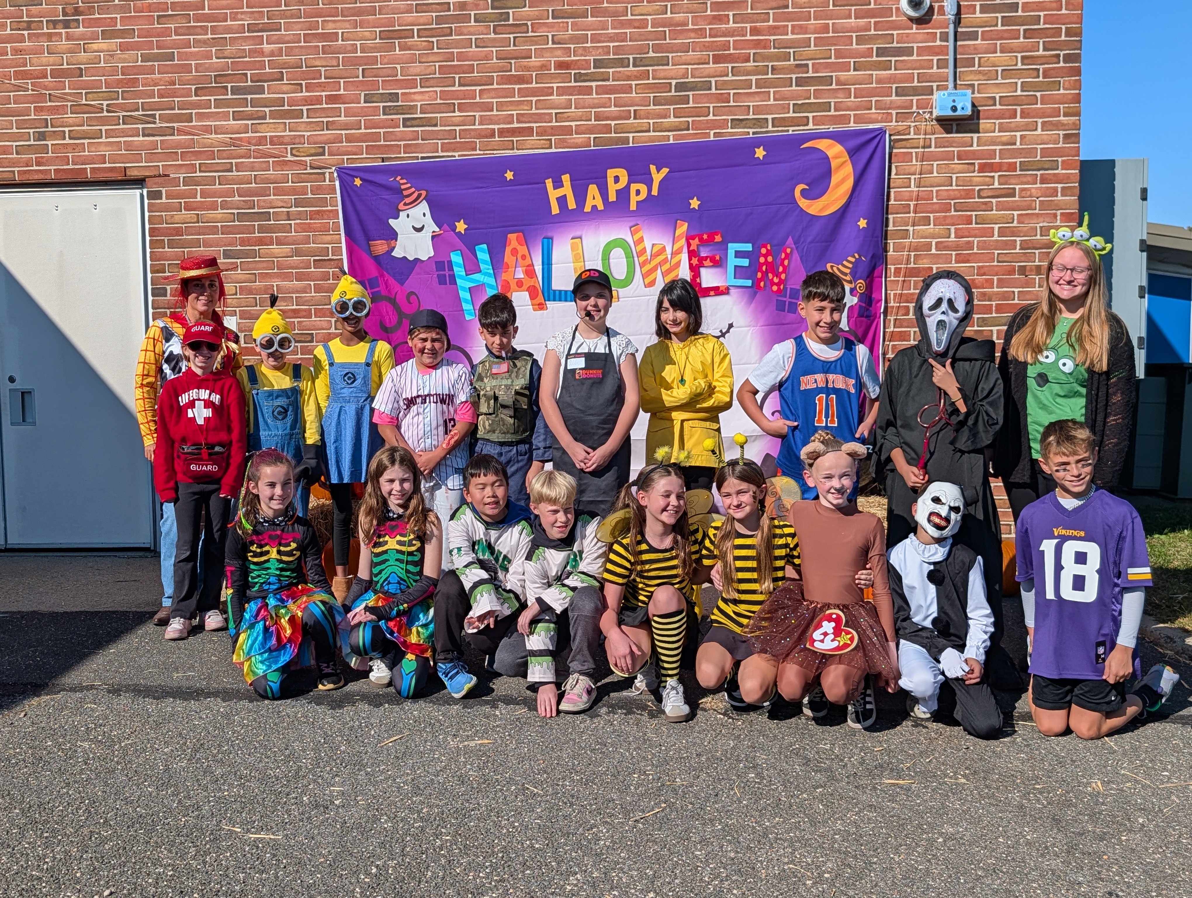 students in halloween costumes