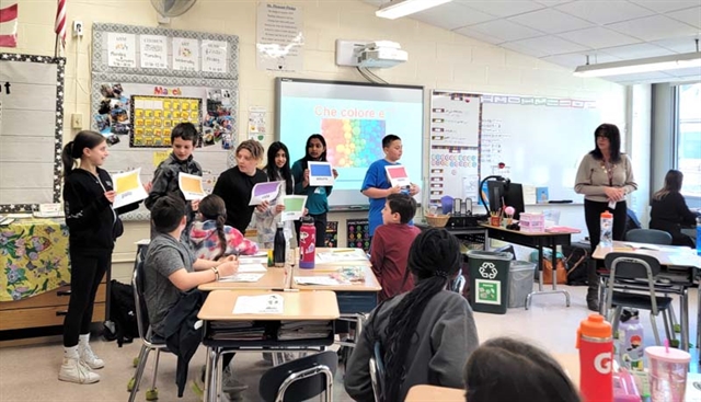HSW world language students speaking with elementary students