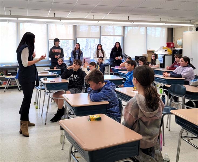 HSW world language students speaking with elementary students