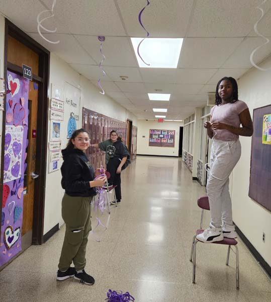 students decorating the hallways