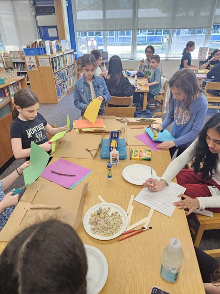 Students working on rock art