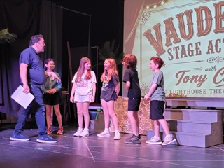 students on stage