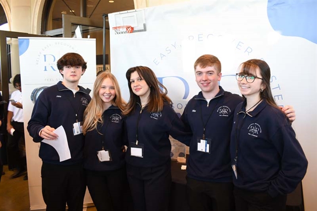 Students posing for picture at event