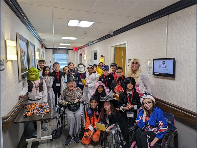 Students visiting St. James Rehabilitation Center on Halloween