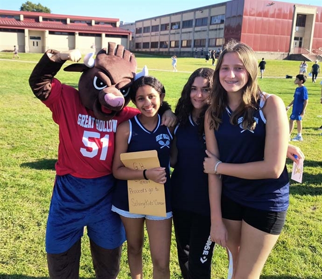 Bull mascot and students