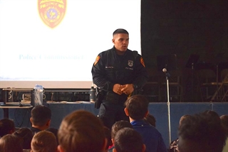 Officer Allison speaking to students