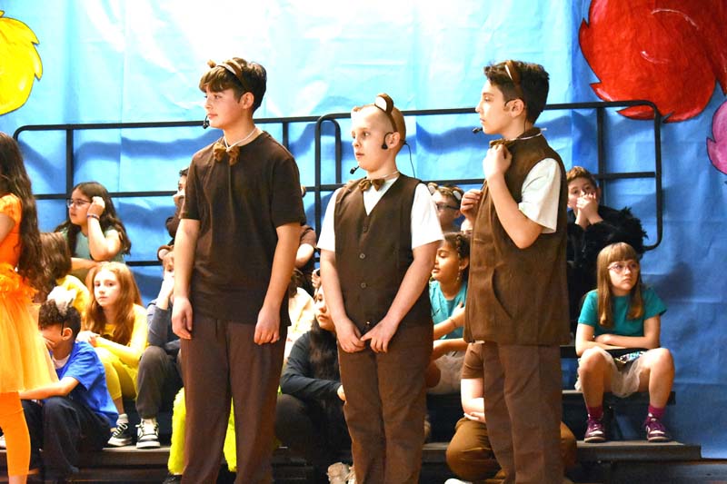 student actors on stage