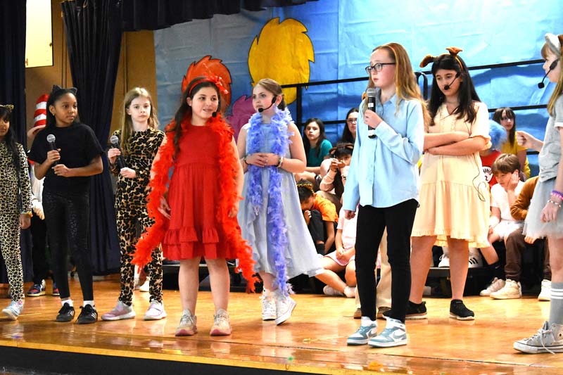 student actors on stage