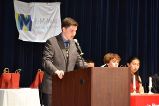Kevin on stage speaking