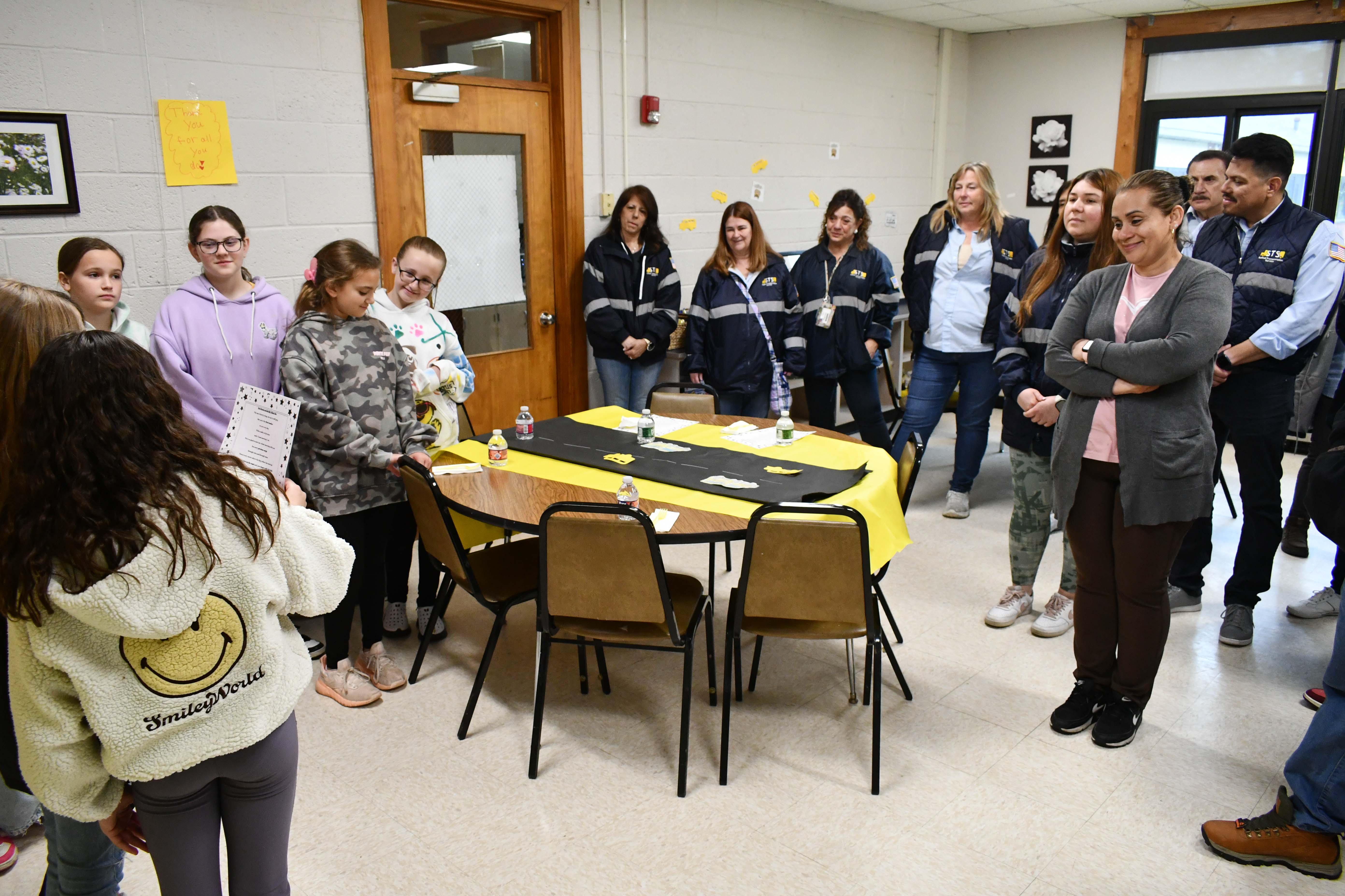 bus drivers and students in class