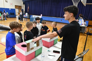 students teaching other students