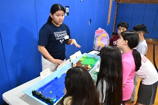 students teaching other students
