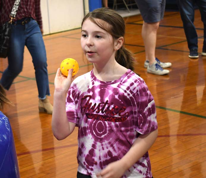 Student throwing a ball