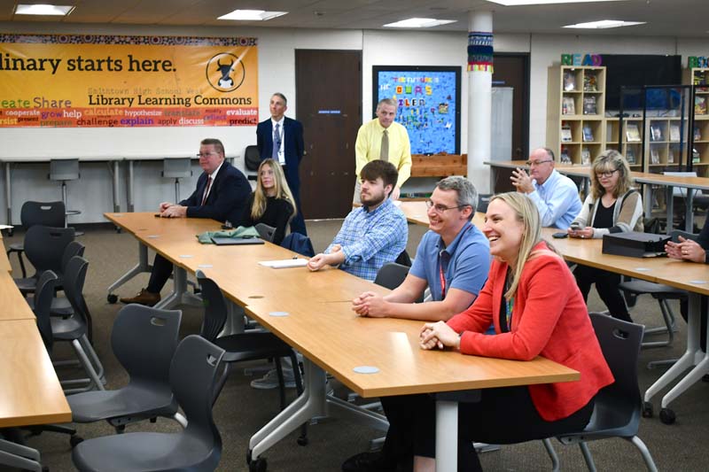 SCSD administration and staff looking on
