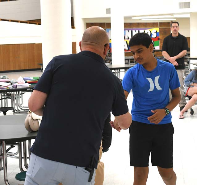 Student shaking hands