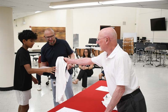 Student receiving award
