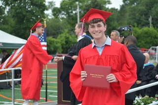 Student with diploma