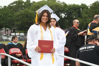 Student with diploma
