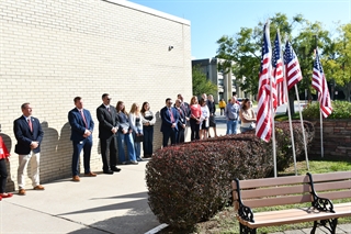 People standing by school