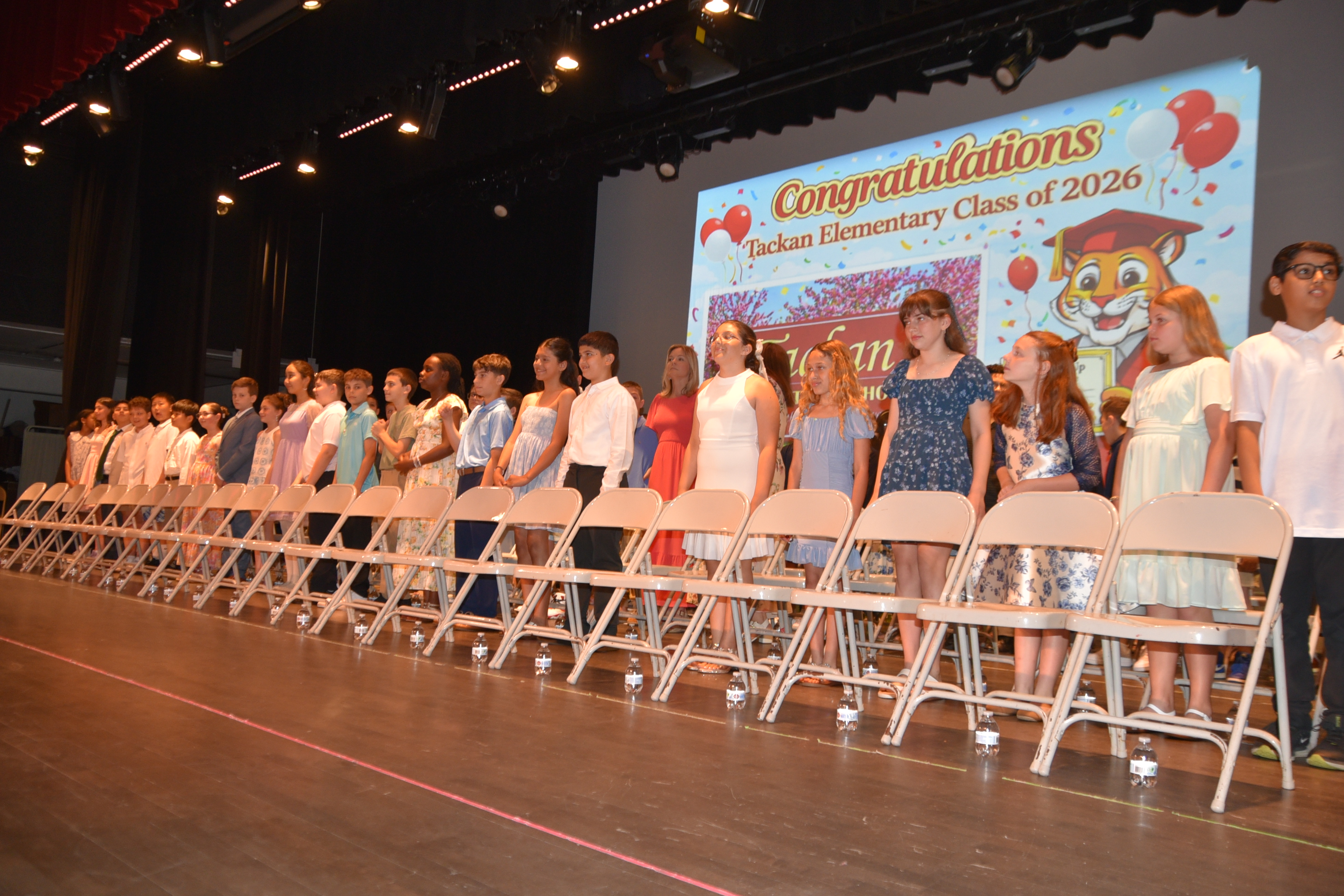 Students on stage