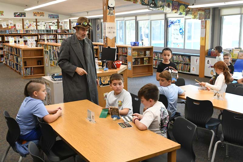 Students looking at clues