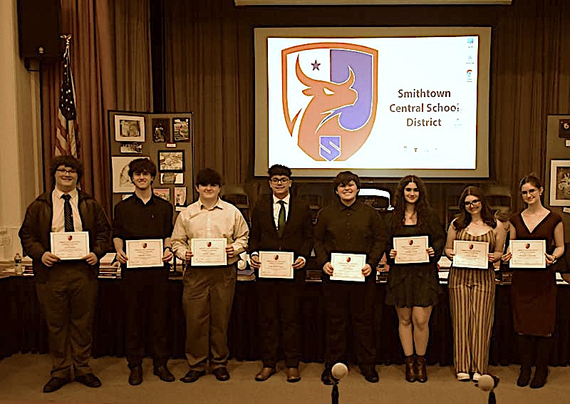 students hold certificates