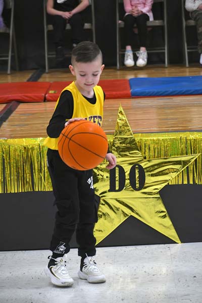 boy playing basketball