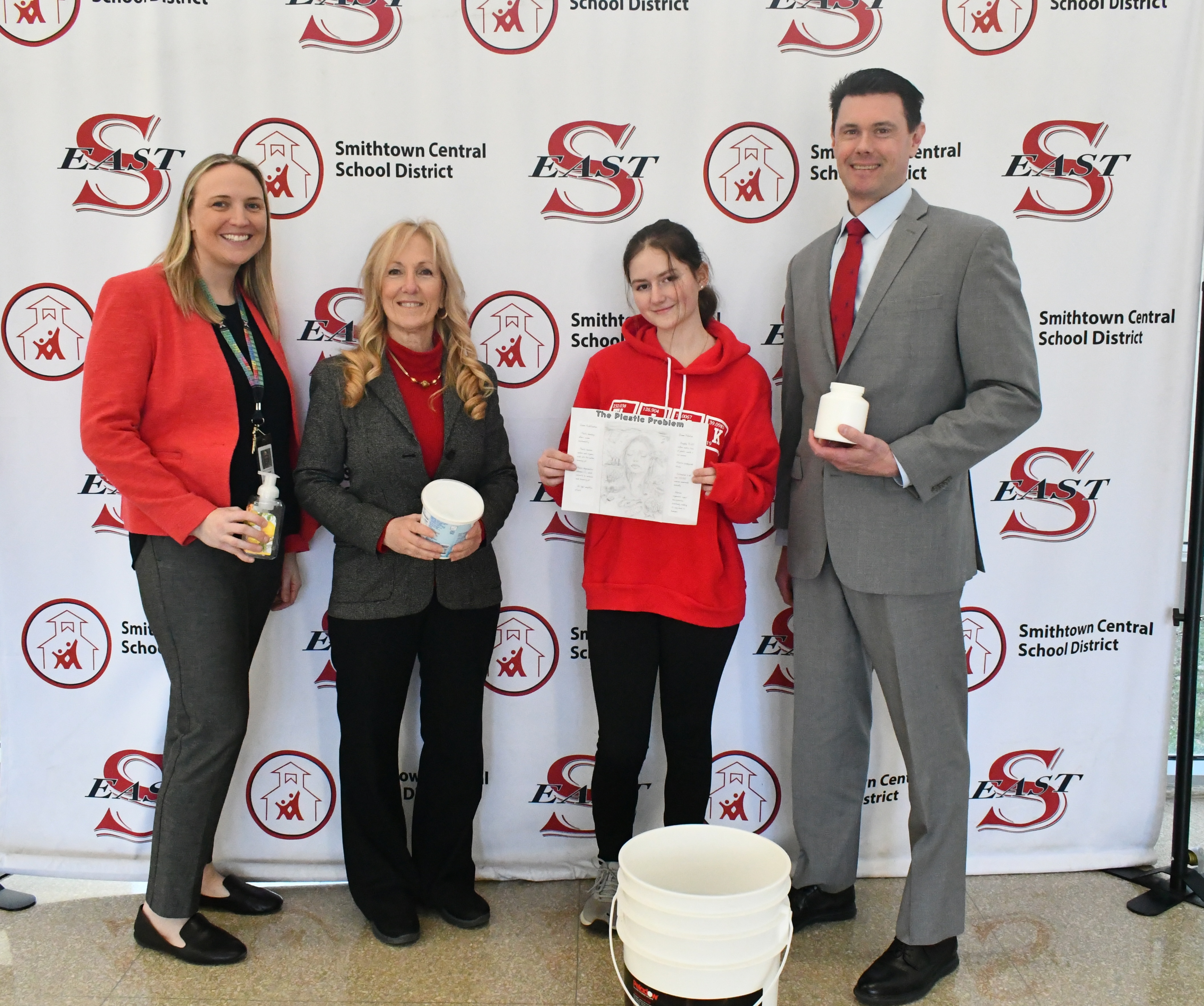 Hailey with HSE Principal Paul McNeil, Director of Science Stephanie O'Brien and Research Coordinator Maria Zeitlin