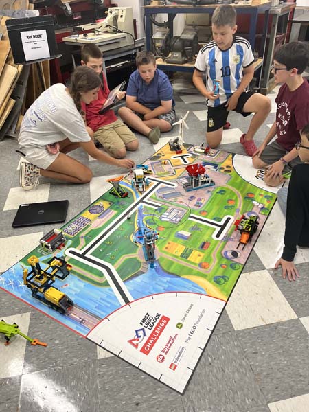 students working on robots