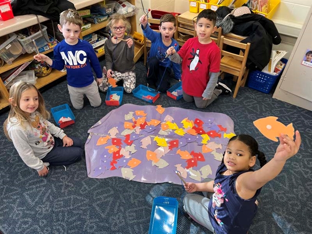 students posing in class