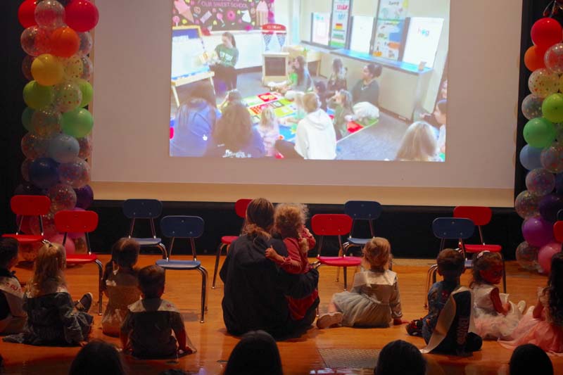 Students watching screen