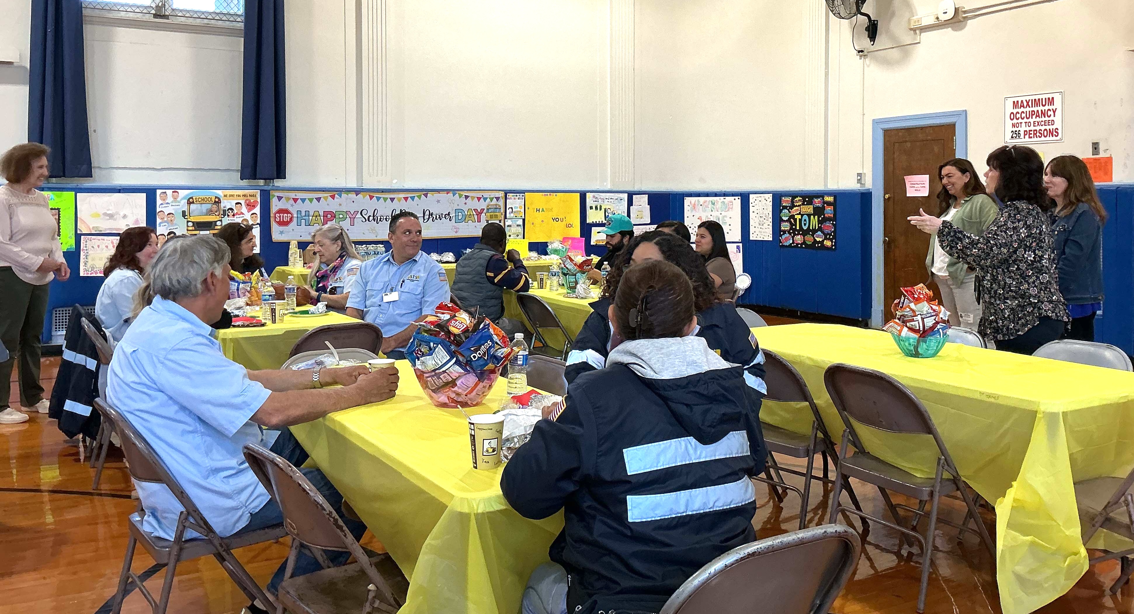 bus drivers sitting at a table