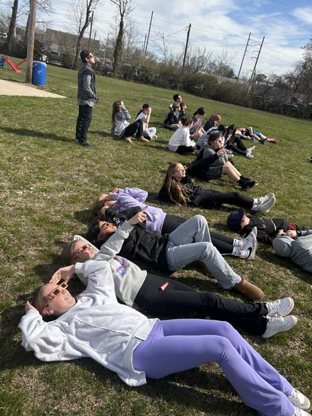 Students viewing solar eclipse