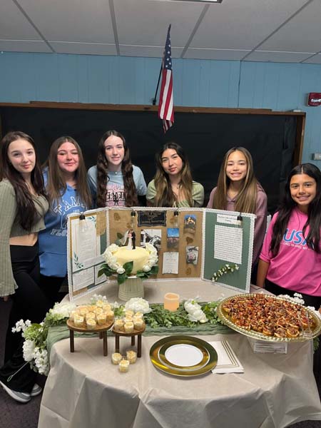 Students by baking exhibit