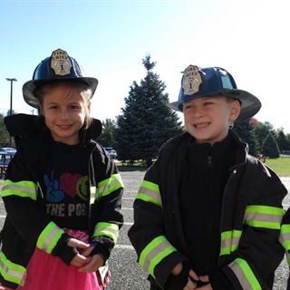 Students dressed as firefighters
