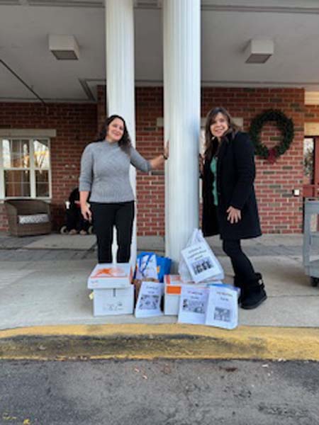 Teachers dropping off gifts to nursing home