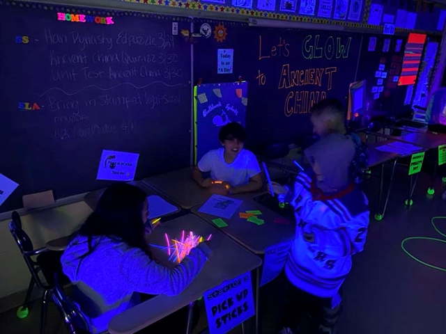 students playing glow in the dark game