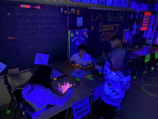 students playing glow in the dark game