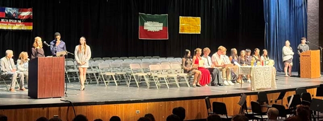 students on stage