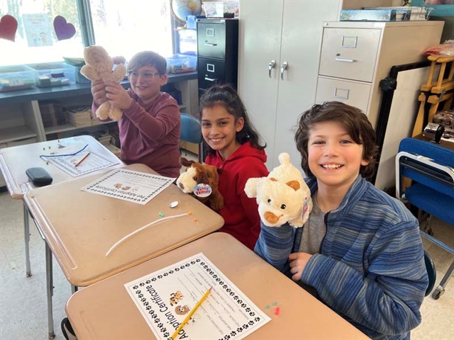 Students with stuffed animals