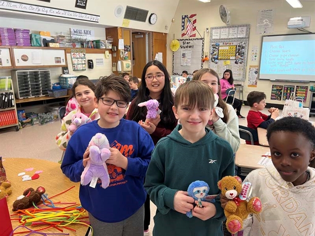 Students with stuffed animals