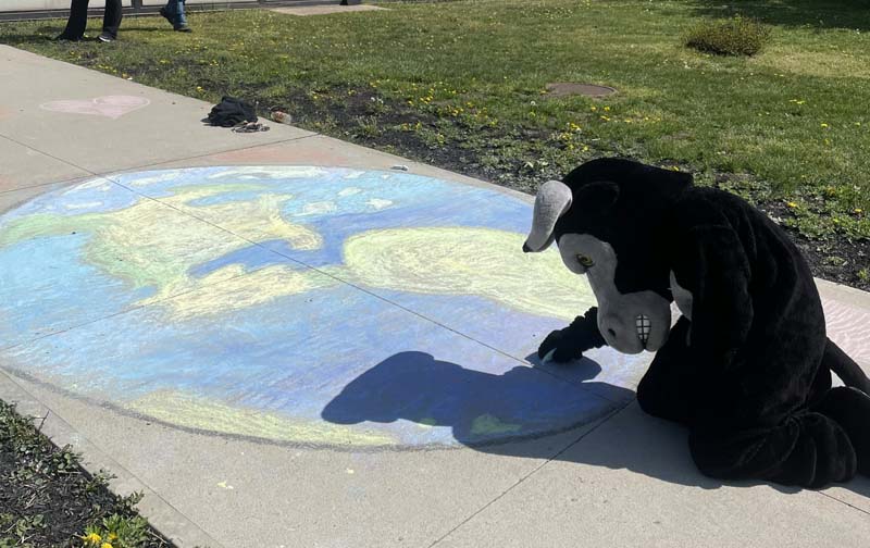 drawing of earth on walkway
