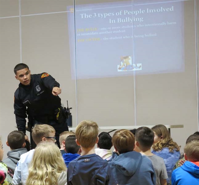 Officer Allison speaking to students