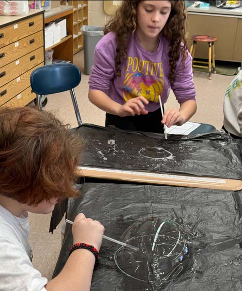 students working with bubbles