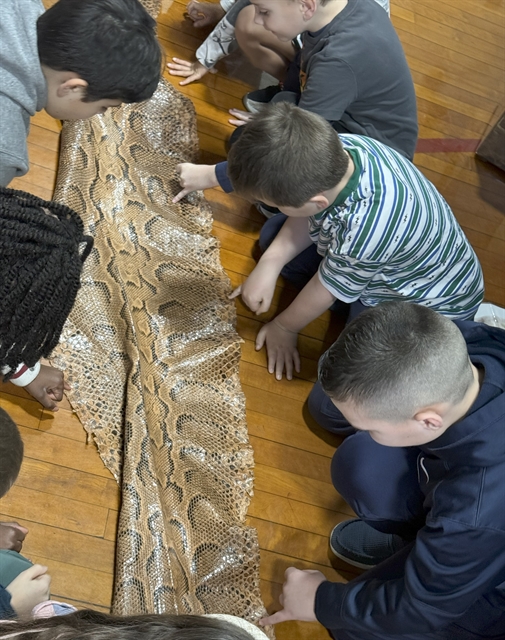 students with reptile