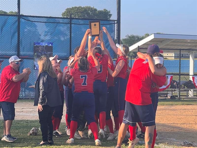 softball team holding trophy